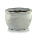 Niska okrągła jasna donica ceramiczna szkliwiona